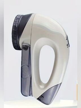 NEW Handheld Fabric Shaver in White and Gray.